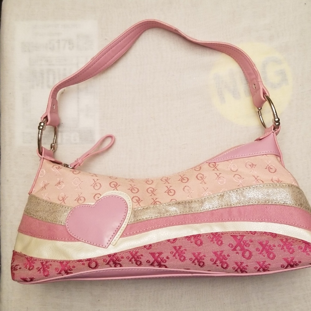 Signature  XOXO bag, with leather embellishments